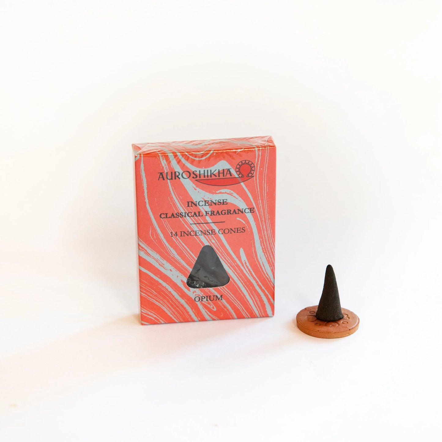 Auroshikha Opium marbled incense cones in red box with black cone and Artschatz terracotta holder. - Opium