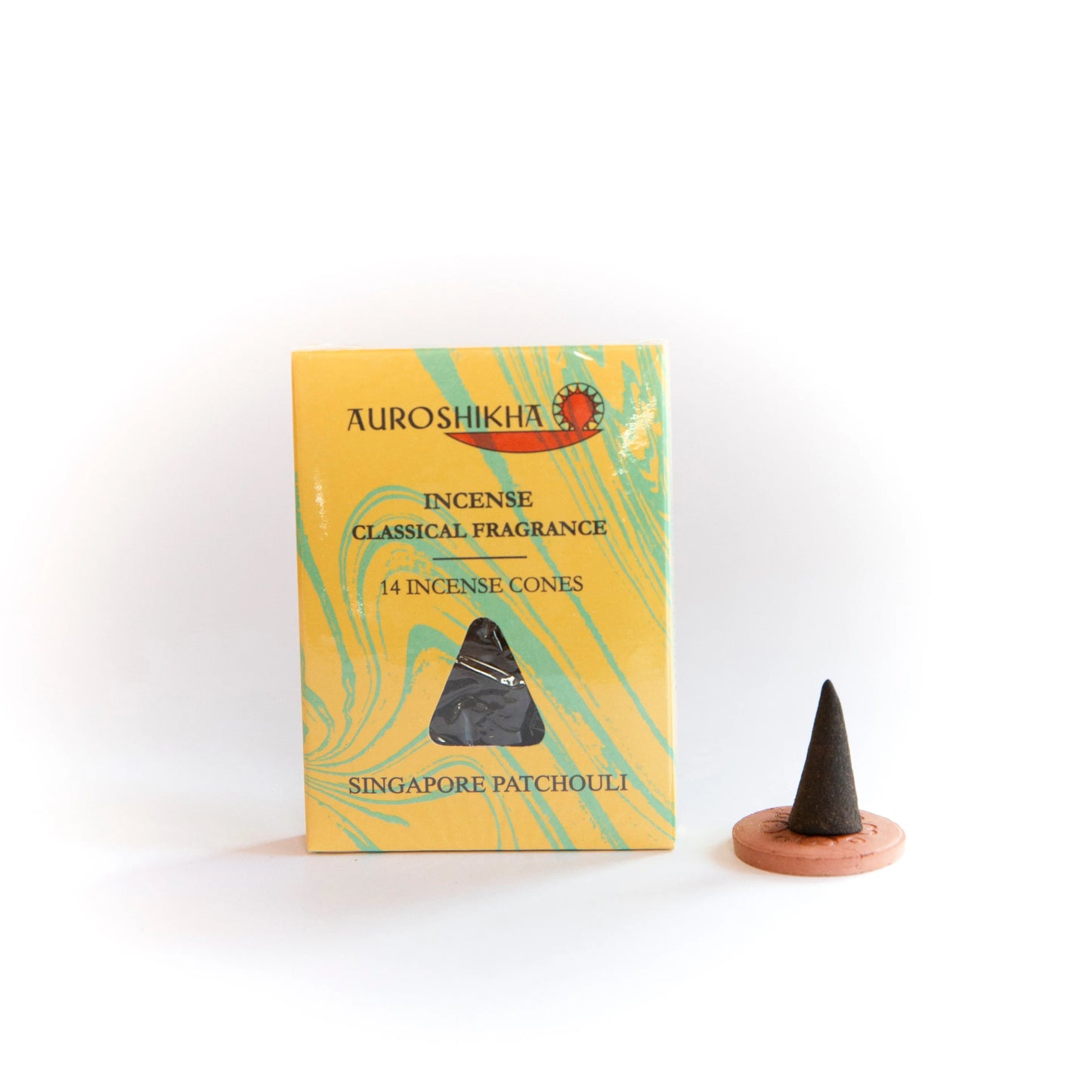 Auroshikha Patchouli incense cone with yellow and green marbled Artschatz packaging and terracotta holder. - Patchouli