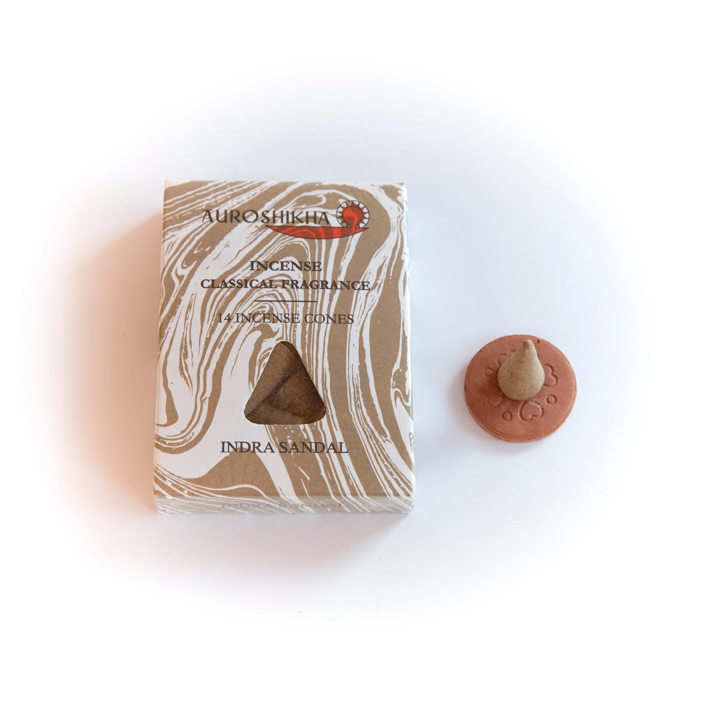 Artschatz Sandalwood Auroshikha marbling cone incense with terracotta holder on white background. - Sandalwood