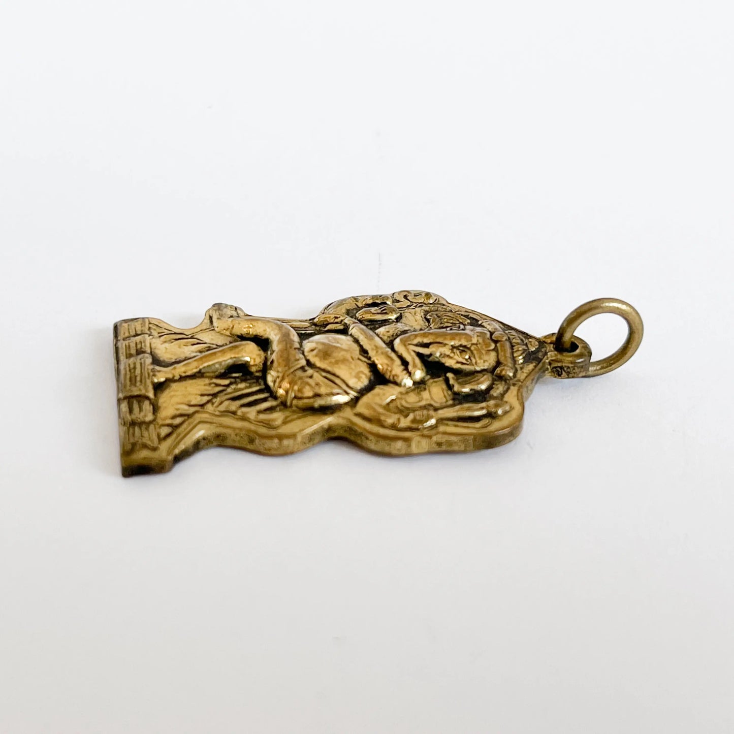 Brass pendant of Dancing Ganesh with intricate detailing and Artschatz branding. - Dancing Ganesh गणेश Nritya Brass Pendant