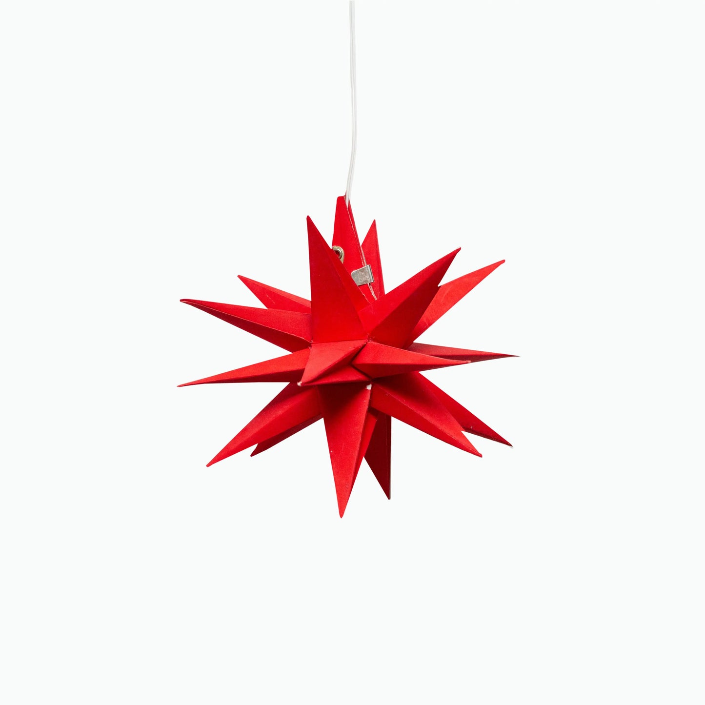 Red 7" Moravian Mini Star paper lantern by Artschatz with sharp pointed tips hanging. - Moravian Mini Star 7" Red