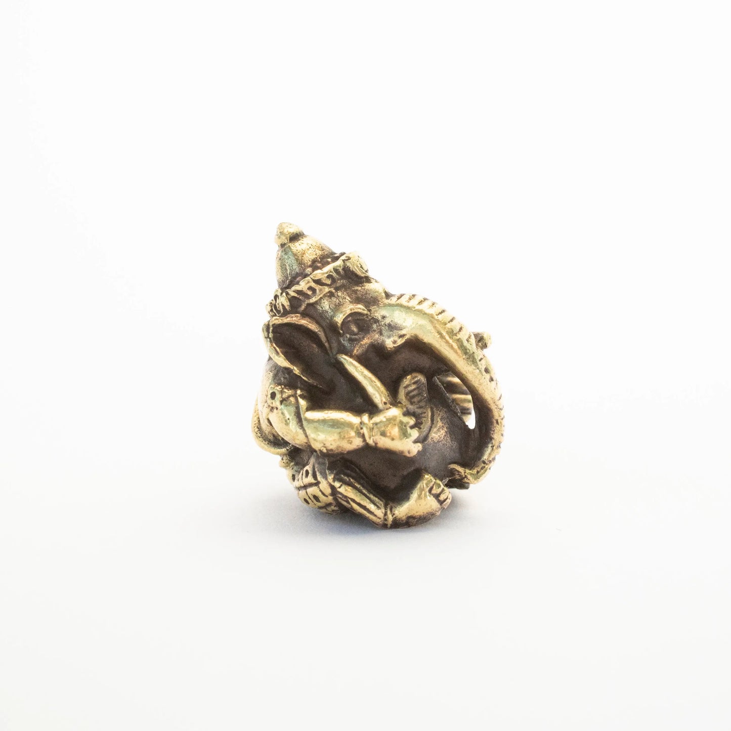 Small brass Ganesh statuette with intricate detailing by Artschatz, pocket-sized and polished. - Pocket Ganesh Brass Statuette