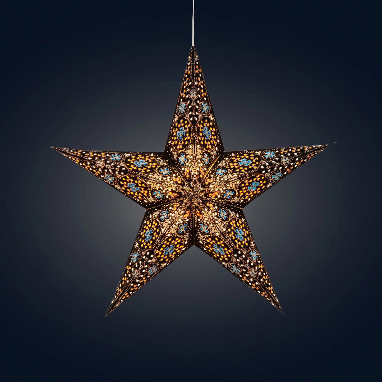 15" black and turquoise Artschatz 5-point paper star lantern with intricate cutouts emitting warm light. - Cathedral 5 Pointer 15" Black/Turquoise